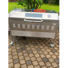 Gas grill with rotating spit