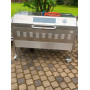 Gas grill with rotating spit