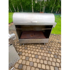 Charcoal grill with rotating spit