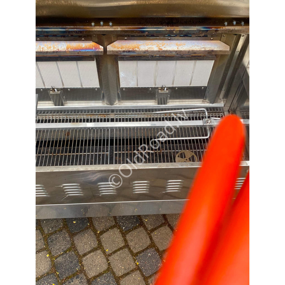 Gas grill with rotating spit