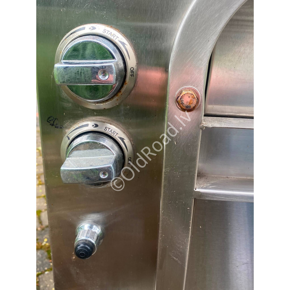 Gas grill with rotating spit