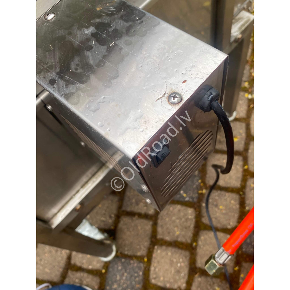 Gas grill with rotating spit